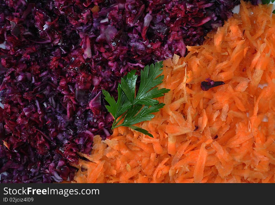 Natural texture with seasonal salad dish with carrots and collard