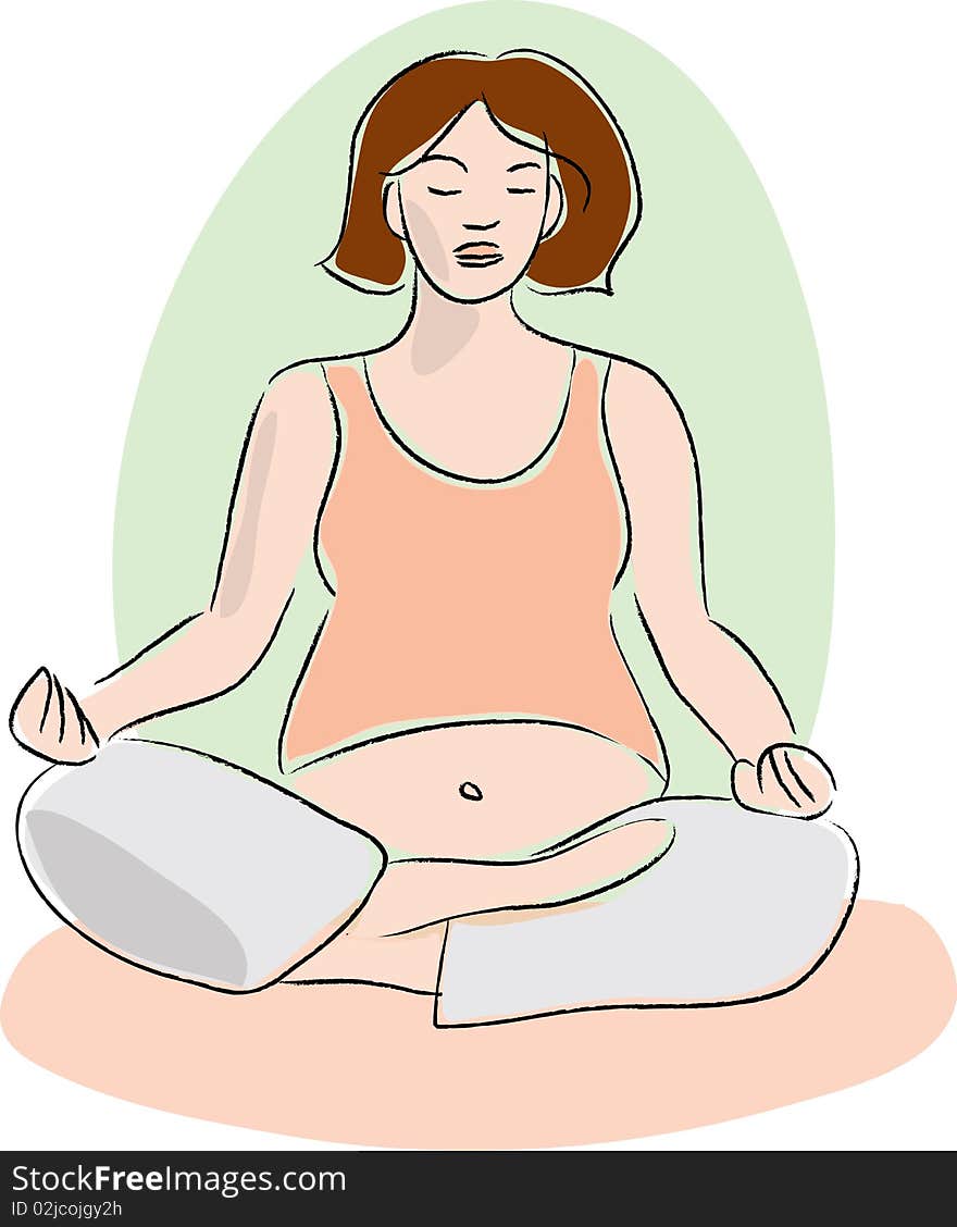Pregnant woman meditating sitting on a pad
