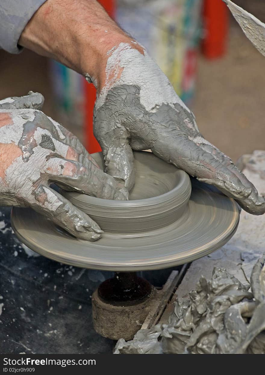 Two old hands making a pot of ceramics. Two old hands making a pot of ceramics