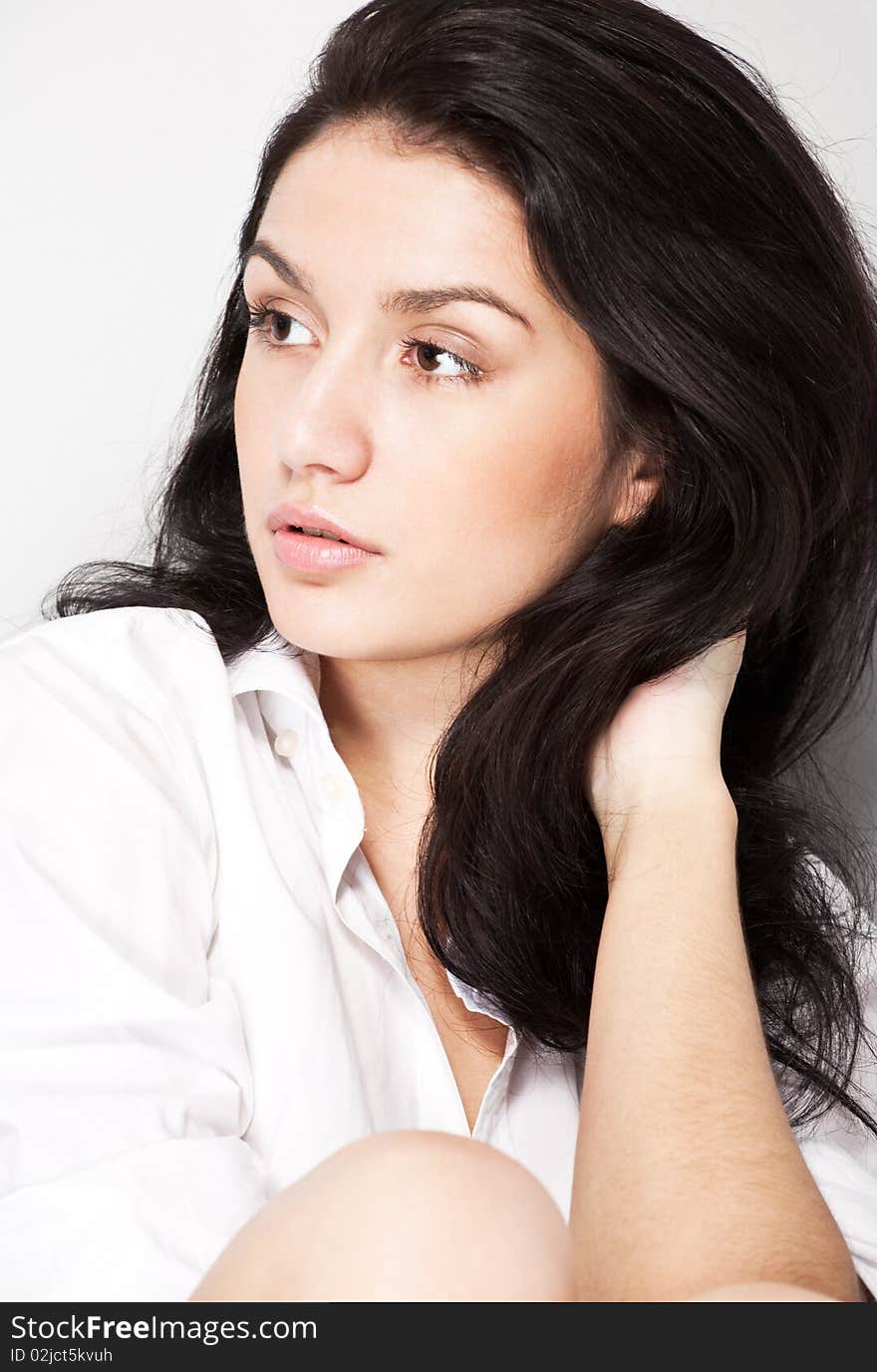 Closeup portrait of young brunette woman. Closeup portrait of young brunette woman