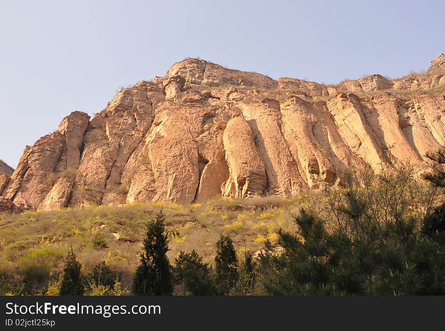 This is taken in banshan in shanxi province of china, cliff is very much like a great wall, specially under the morning sunshine. This is taken in banshan in shanxi province of china, cliff is very much like a great wall, specially under the morning sunshine