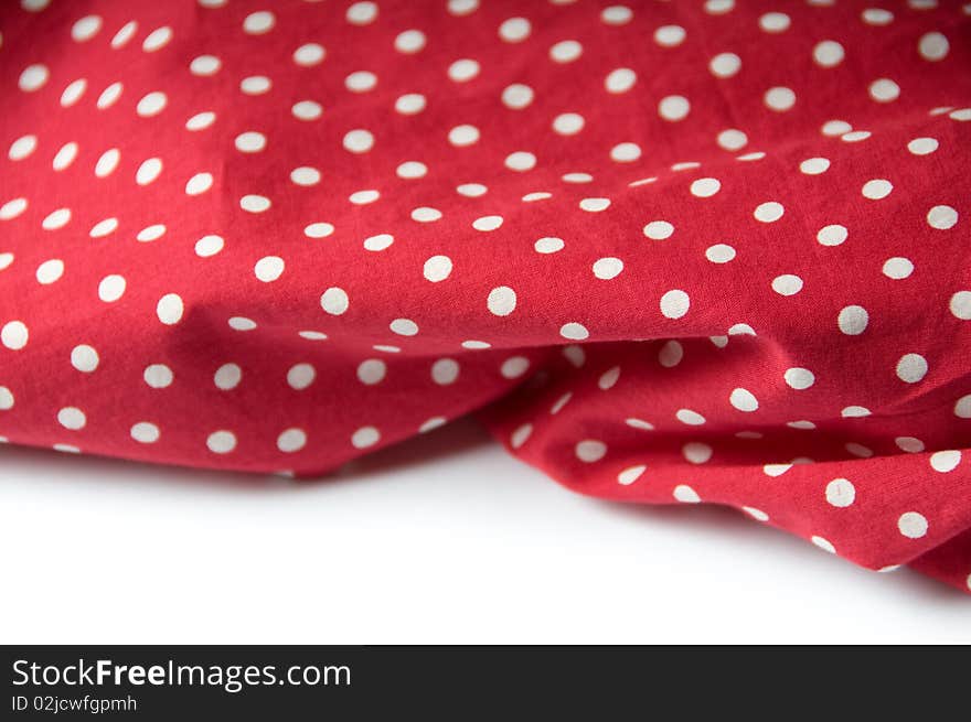 Red textile with white dots. Red textile with white dots