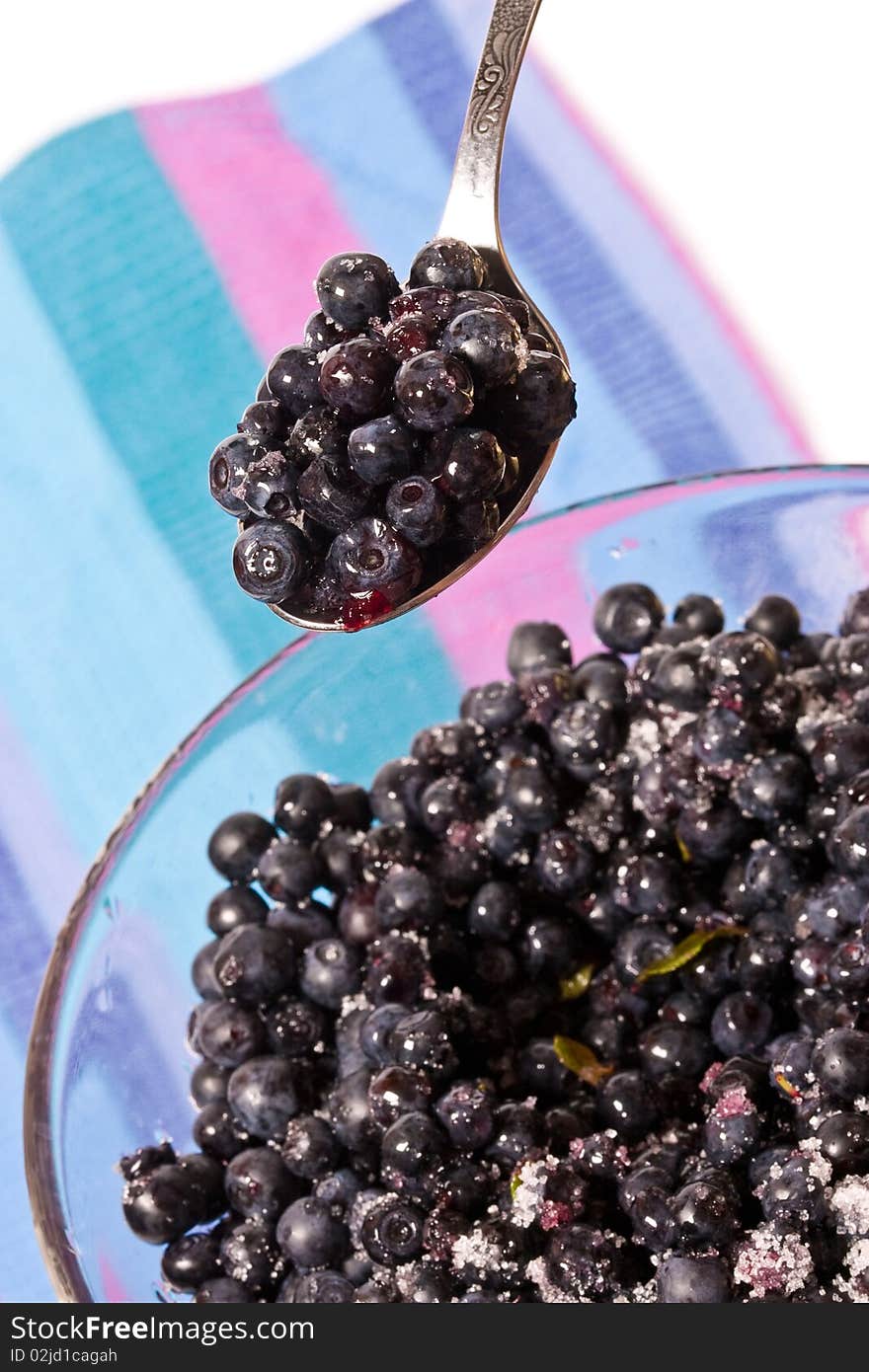 Food series: ripe bilberries in the glass bowl