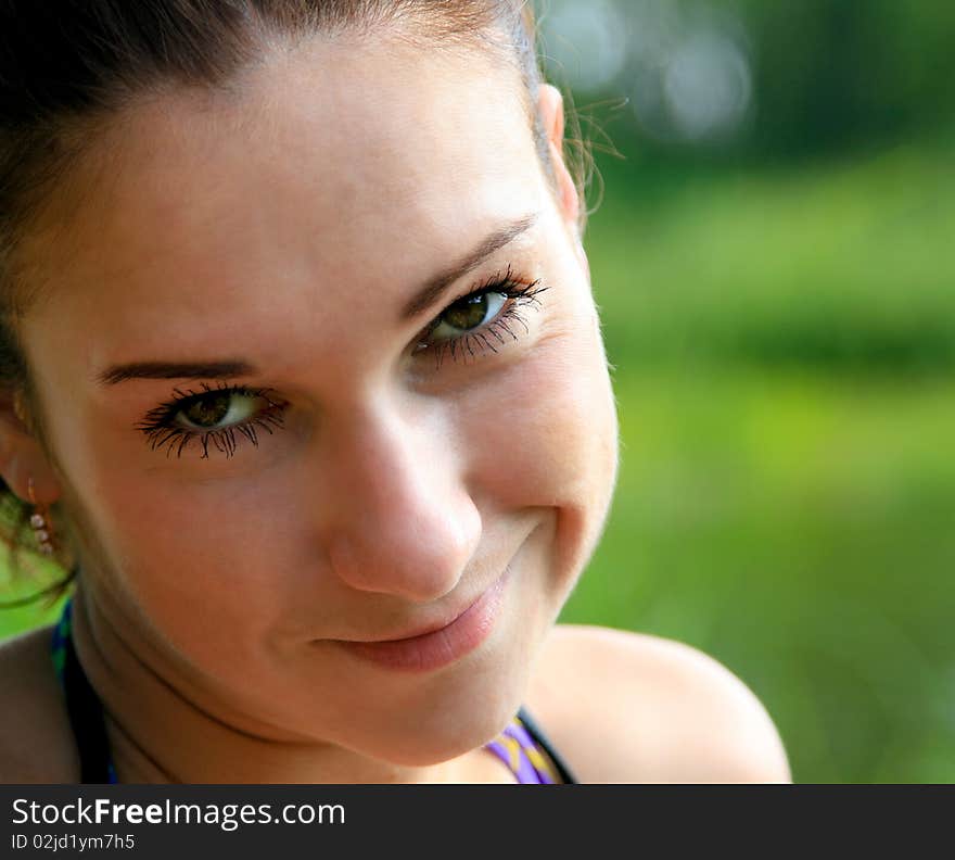 Portrait of a nice woman smiling at the camera. Portrait of a nice woman smiling at the camera