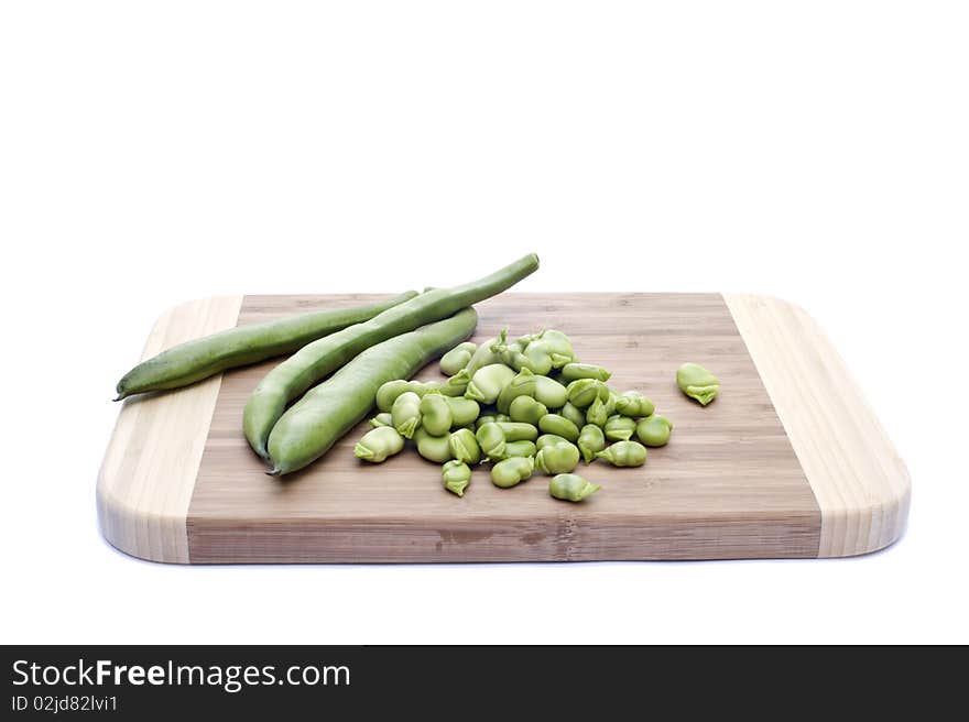 A platter with beans on white background. A platter with beans on white background