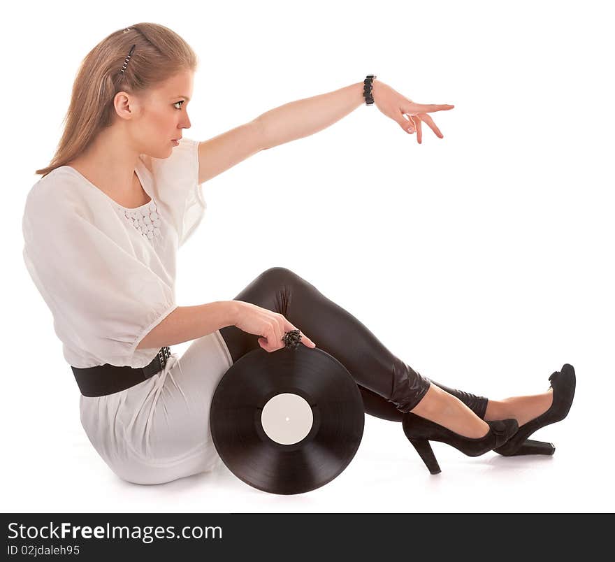 Young girl with a vinyl record on white. Young girl with a vinyl record on white