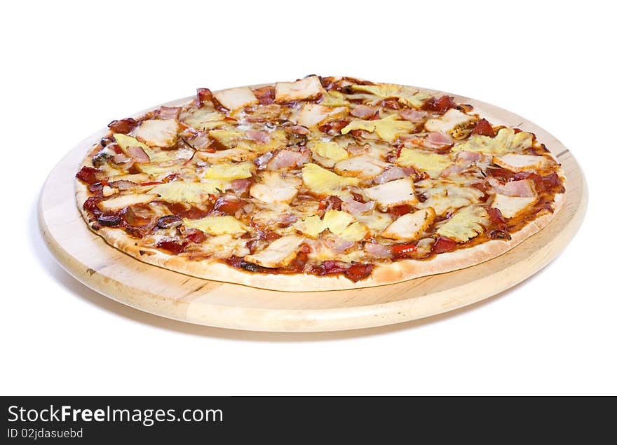 Ham and pineapple pizza on white ground