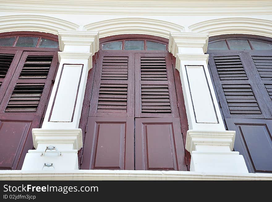 Windows to a traditional Sino-Portugese building in Phuket town, Thailand. Windows to a traditional Sino-Portugese building in Phuket town, Thailand