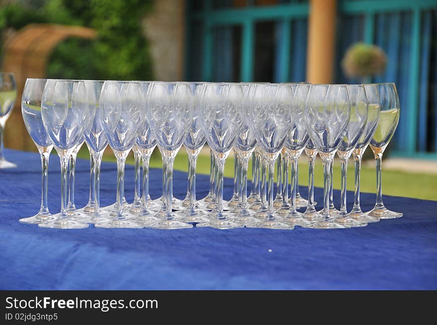 Some glasses on a table.