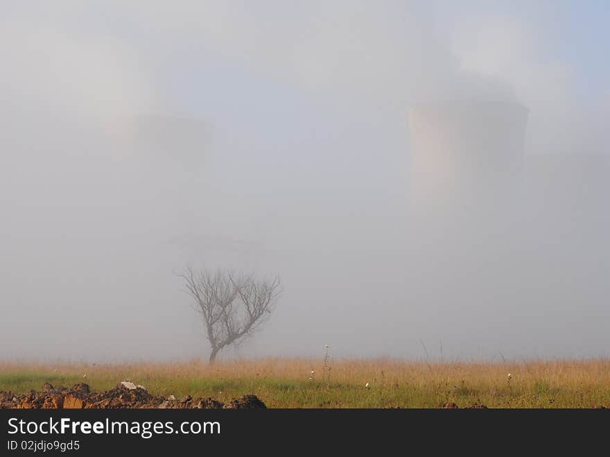 Power Station ghost-like in mist. Power Station ghost-like in mist