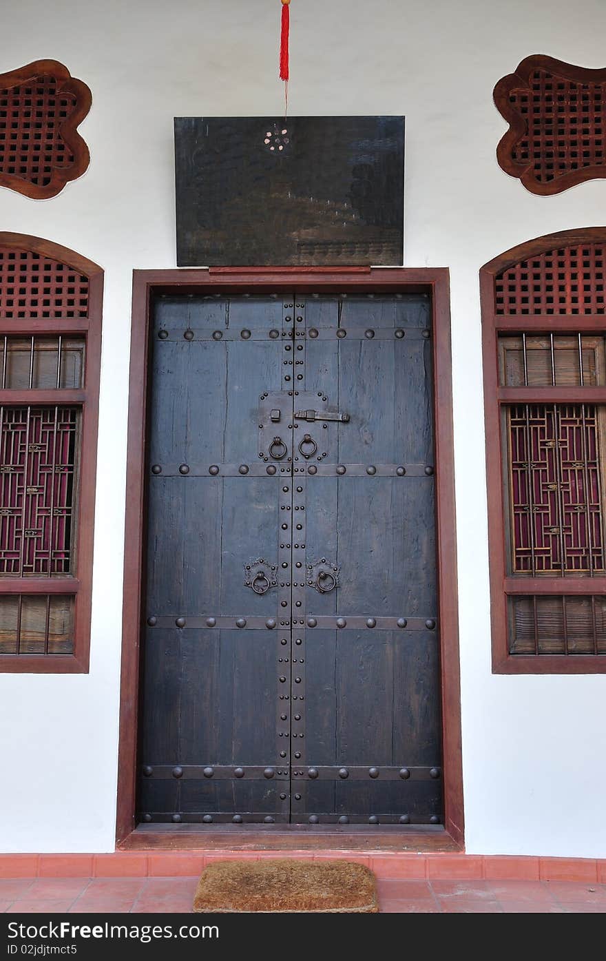 Door to a traditional Sino-Portugese building in Phuket town, Thailand. Door to a traditional Sino-Portugese building in Phuket town, Thailand