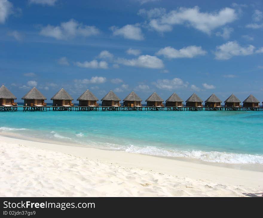 Water bungalow on the sea with amazing beach and sky. Water bungalow on the sea with amazing beach and sky.