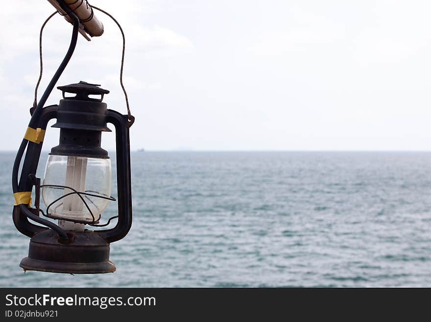 Old lamp at the sea.