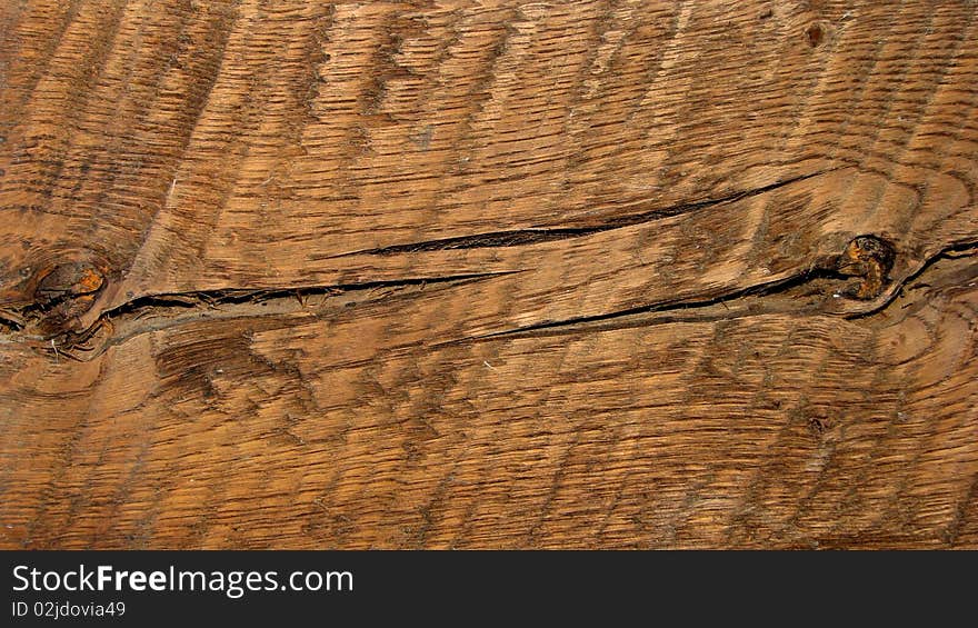 Dark rough wood structure with branch, background