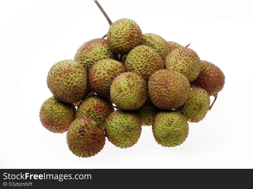 Pile of fresh litchi isolated on white. Produced fruit in southern China.