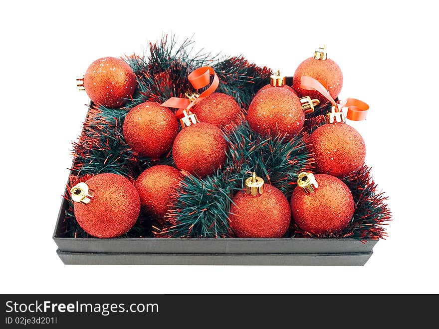 Set of red Christmas balls in a black box. Set of red Christmas balls in a black box