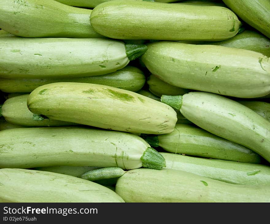 A lot of green pumpkins ready to be cook