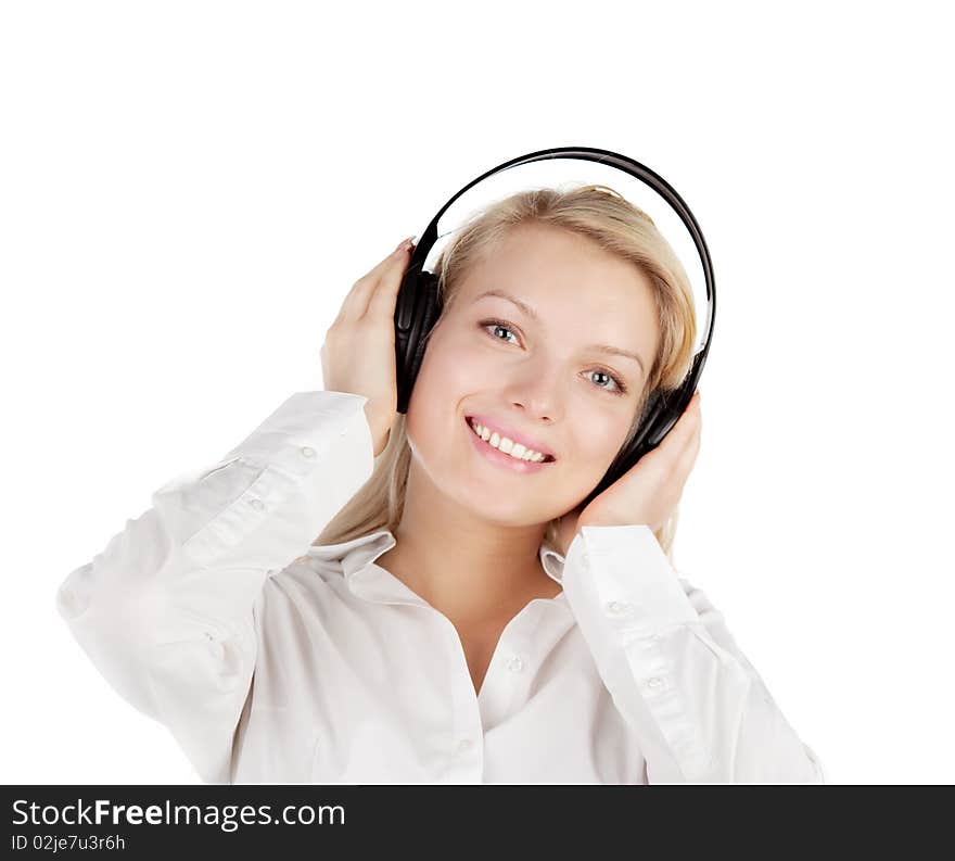 Young blonde with headphones isolated on white