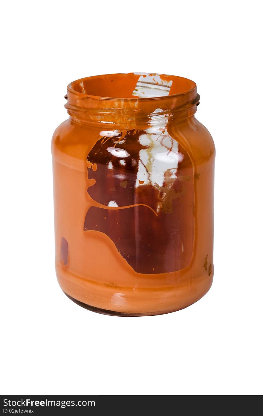 Opened empty glass jar with dry orange color inside