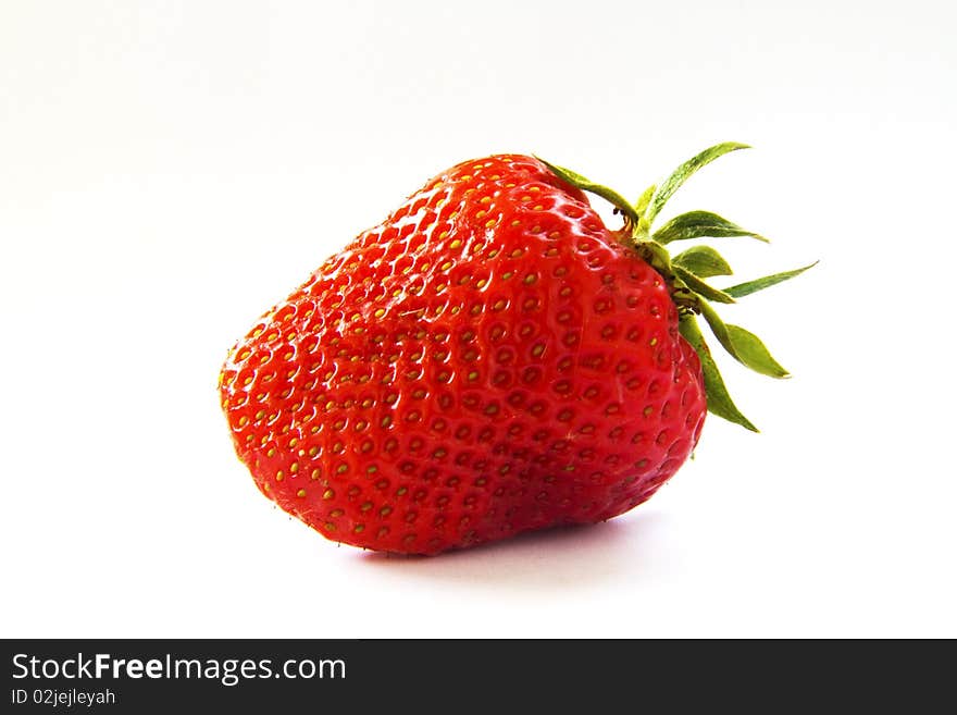 Ripe strawberries on a white background. Ripe strawberries on a white background