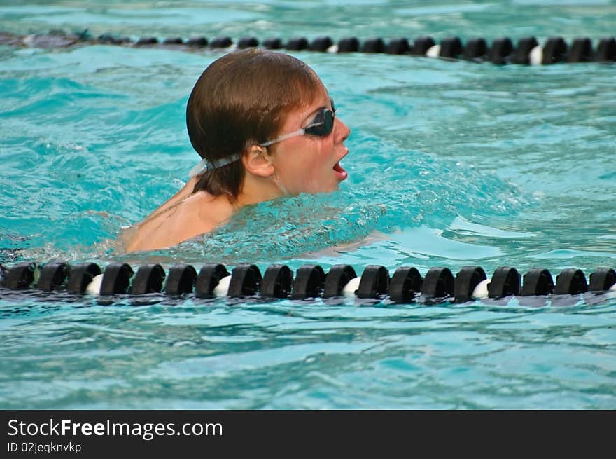 Young Boy /Breaststroke in Pool