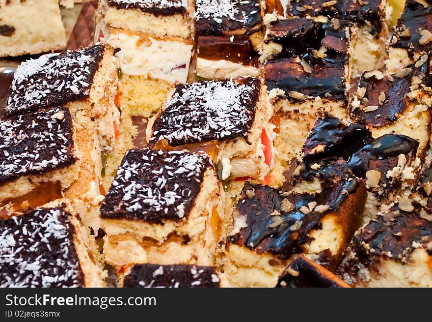 Cake with chocolate, cream divided to pieces