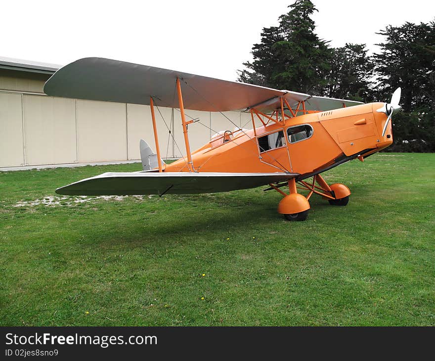 De Havilland DH 83 Foxmoth biplane parked on grass. De Havilland DH 83 Foxmoth biplane parked on grass