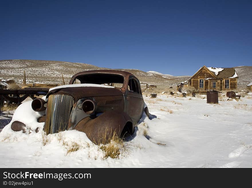 Old Broken car in snow