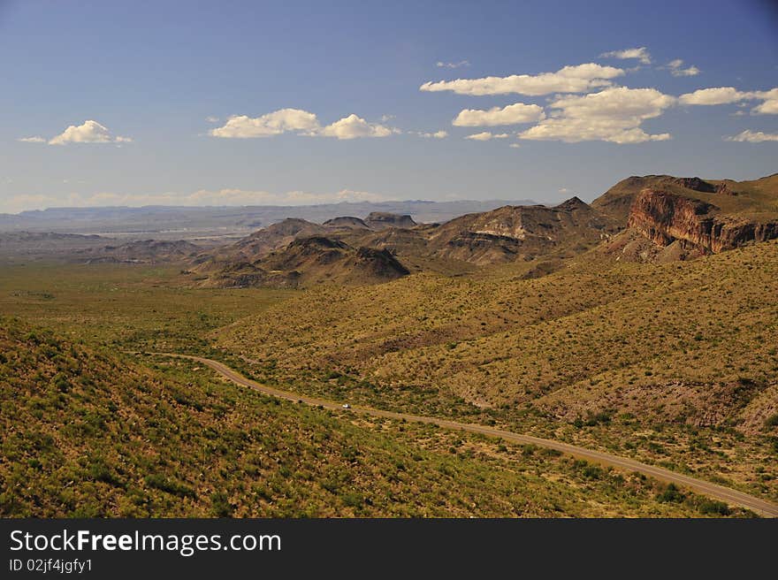 Taken in Big Bend NP, auto on road gives perspective to distance. Taken in Big Bend NP, auto on road gives perspective to distance