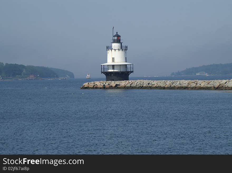 Spring Point Lighthouse is located in the harbor of Portland, Maine.