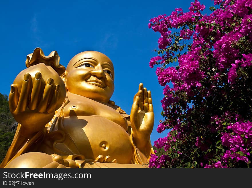 A golden Buddha disciple statue