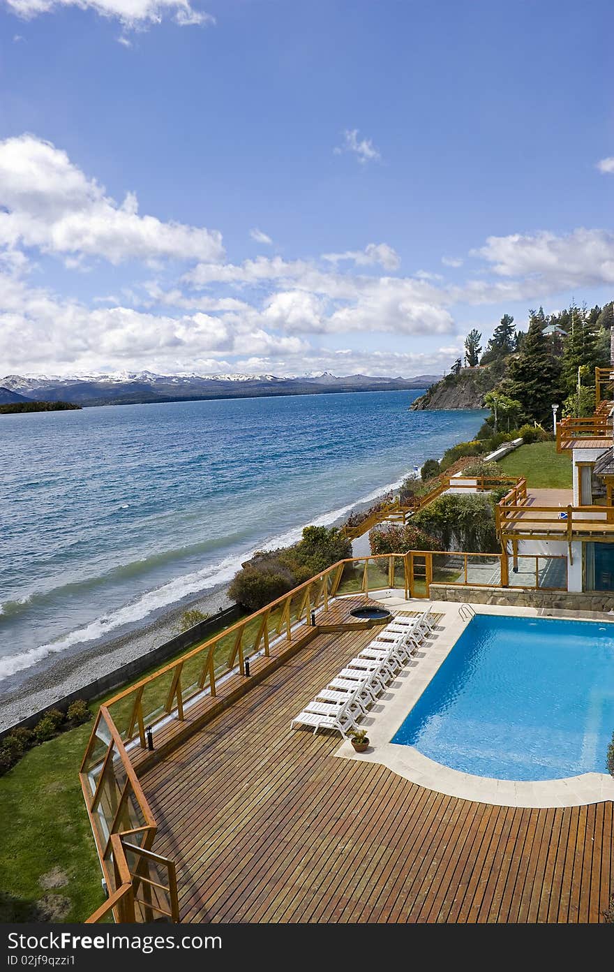 Hotel resort pool by the lake shore