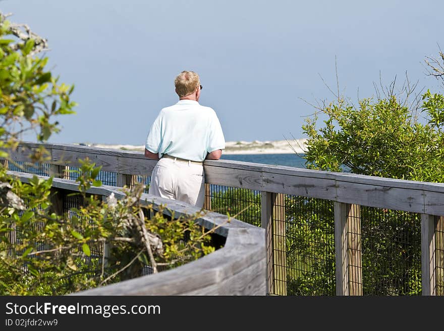 A senior man enjoying nature.