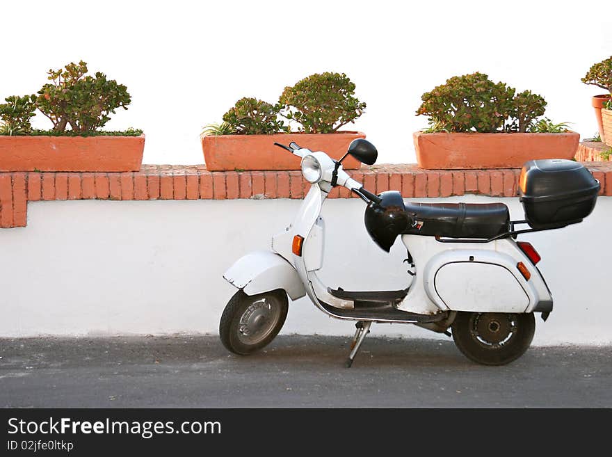 Motorbike And Wall With Planter Boxes