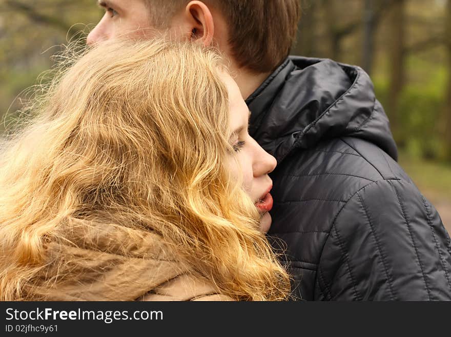 Girl's head on the shoulder of man