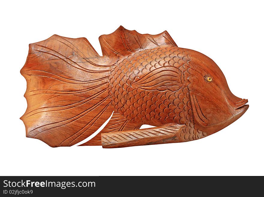 Wood carve fish handmade on wwhite background