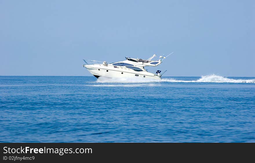 Beautiful boat flying on sea waves. Beautiful boat flying on sea waves