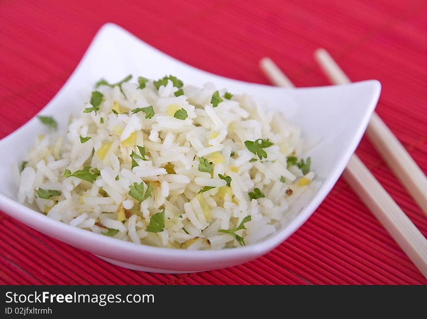 Bowl of rice with chopsticks