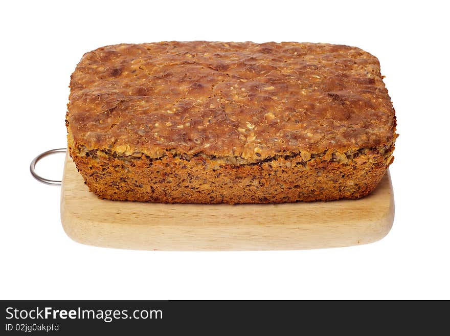 Rye bread on wooden board isolated white background