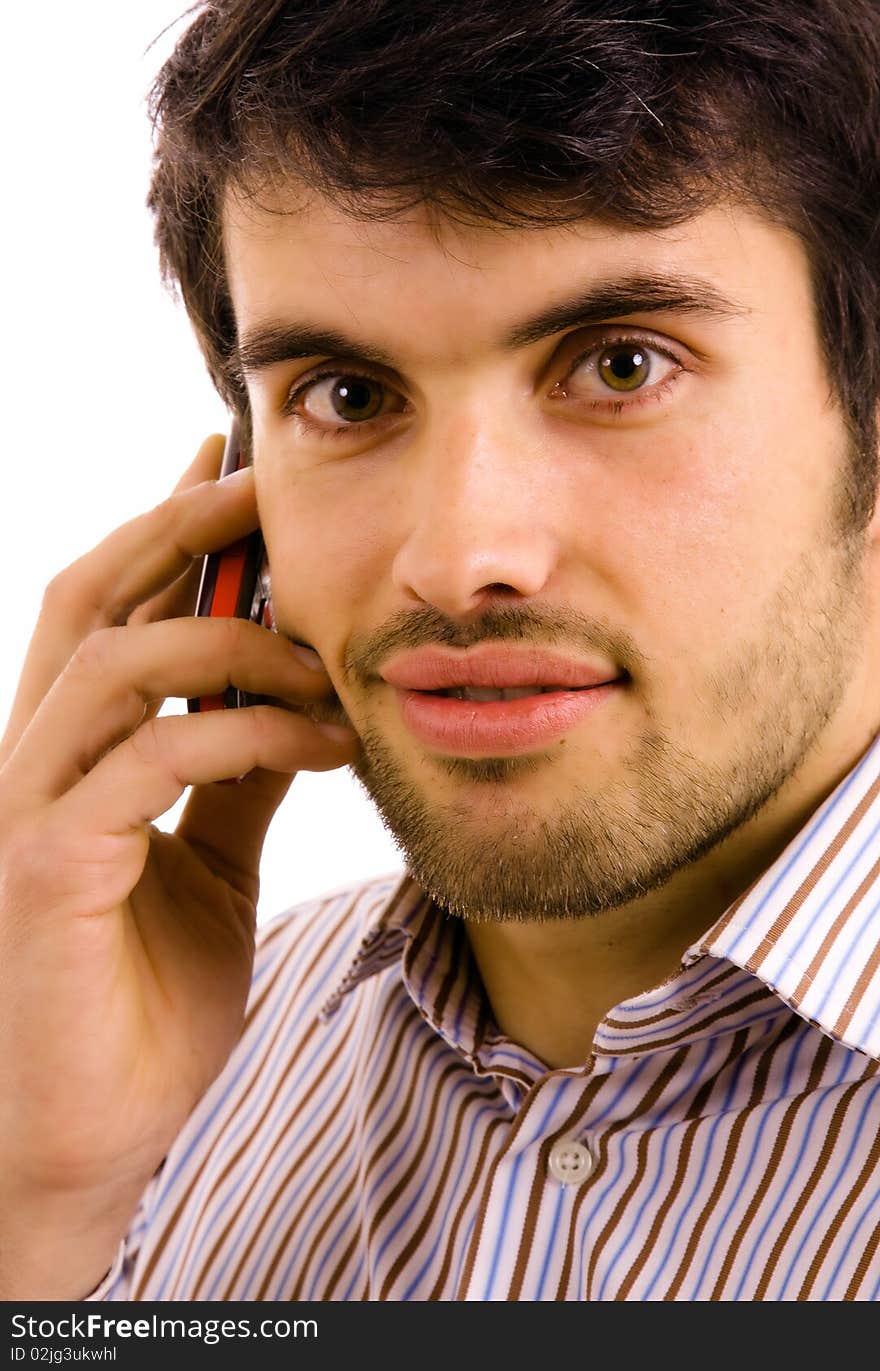 Close up portrait of young man on the phone, isolated on white