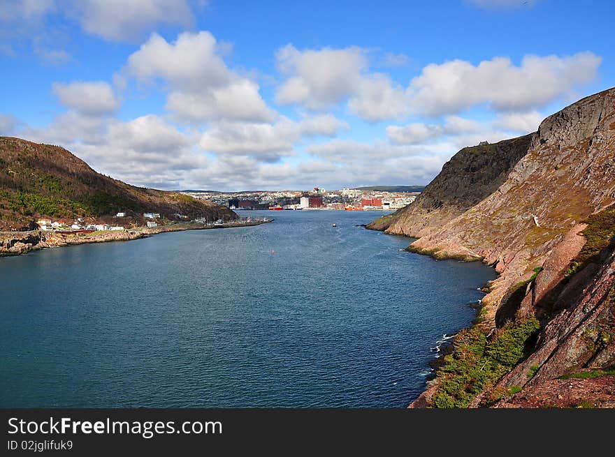 Newfoundland in Canada is known for it's many picturesque coastal harbours and towns. This particular one is of the Capital City of Newfoundland St John's. Newfoundland in Canada is known for it's many picturesque coastal harbours and towns. This particular one is of the Capital City of Newfoundland St John's.