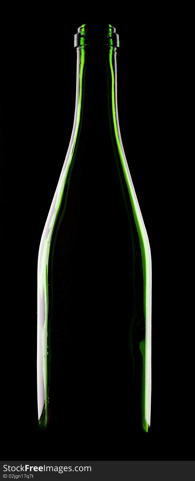 Green glacc bottle of wine and wineglass on black background