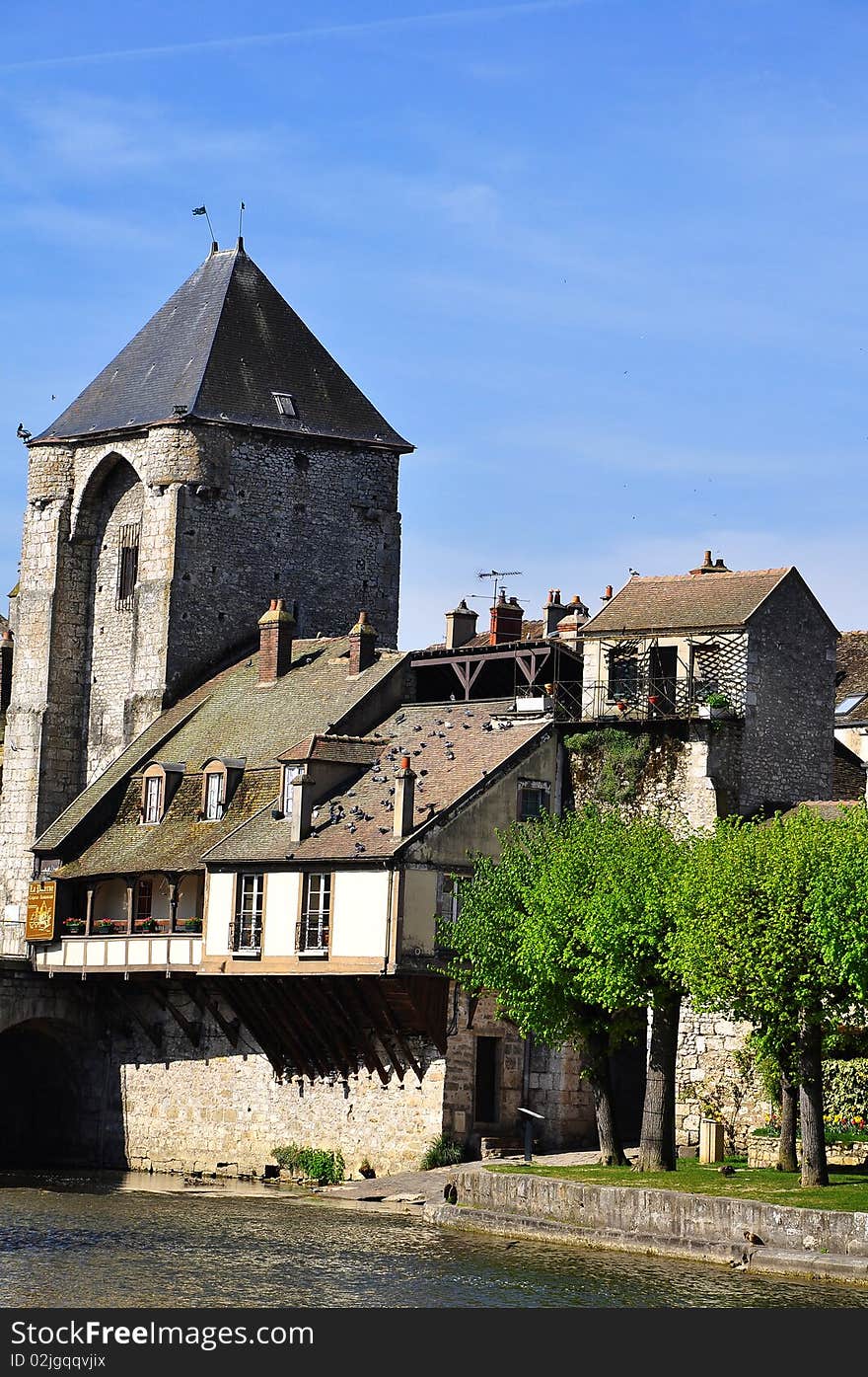 A french medieval town with her tower and her old buildings. A french medieval town with her tower and her old buildings