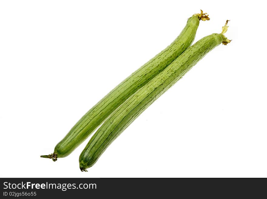 Fresh loofah isolated on white. It is very rich in nutritional value. It can not only edible, but also have medicinal value.(in traditional Chinese medicine)