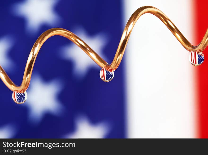 Close up on drops of water with American Flag.