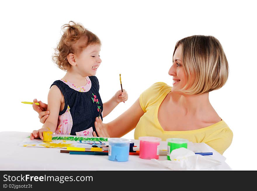 A young mom and her little daughter paint colors in this album