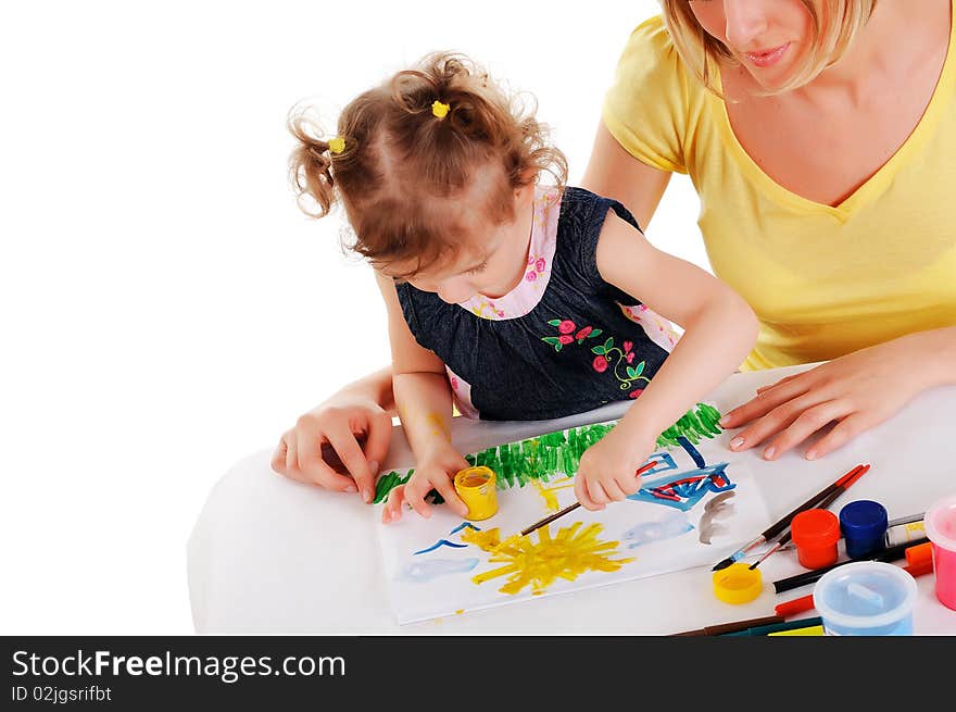 A young mom and her little daughter paint colors in this album