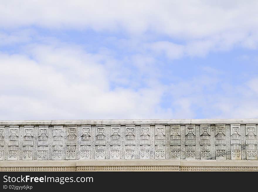 Marble fence and blue sky background