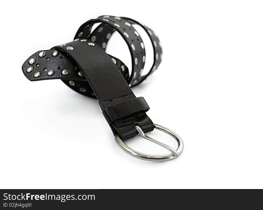 Black belt with metal detail, isolated on a white background. Black belt with metal detail, isolated on a white background