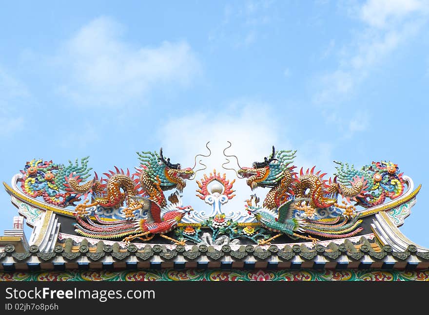 Dragon sculpture on Chinese temple roof in Bangkok. Dragon sculpture on Chinese temple roof in Bangkok